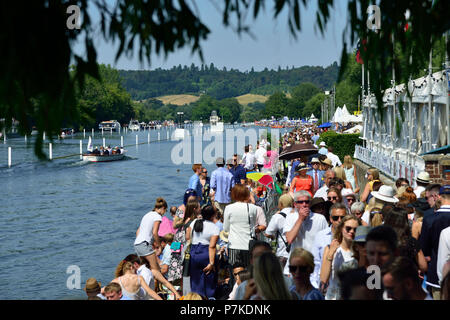 Henley Royal Regatta, Henley-On-Thames, UK. 6th July 2018. The third day of the Henley Royal Regatta took place on a stunning day in the Thames Valley.  The banks of the River Thames were packed with spectators enjoying one of the social events of the summer together with watching some of the worlds best rowers.Credit Wendy Johnson/Alamy Live News Stock Photo