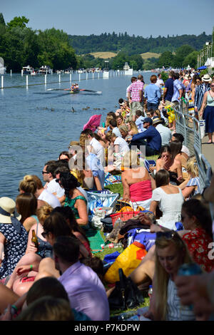 Henley Royal Regatta, Henley Royal Regatta, Henley-on-Thames, UK. 6th July 2018. The third day of the Henley Royal Regatta took place on a stunning day in the Thames Valley.  The banks of the River Thames were packed with spectators enjoying one of the social events of the summer together with watching some of the worlds best rowers. Credit Wendy Johnson/Alamy Live News Stock Photo