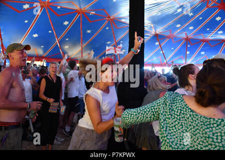 Wadebridge, Cornwall, UK. 7th July 2018. The organisers of the annual Rock Oyster Festival had the foresight to setup a screen for the England Football game. Seen here fans waiting the final moments, then the full time whistle. Credit: Simon Maycock/Alamy Live News Stock Photo