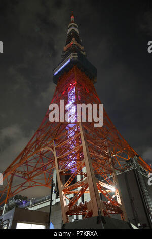 Tokyo, Japan. 7th July, 2018. Tokyo Tower is illuminated to celebrate the annual festival of Tanabata in Tokyo. Thousands of LED lights representing the Milky Way are decorating the first floor of Tokyo Tower's Main Deck to commemorate the annual celebration of Tanabata. According to legend, the Milky Way separates two lovers, Orihime (Vega) and Hikoboshi (Altair), who may only meet once a year on the seventh day of the seventh month of the calendar. Credit: Rodrigo Reyes Marin/via ZUMA Wire/ZUMA Wire/Alamy Live News Stock Photo