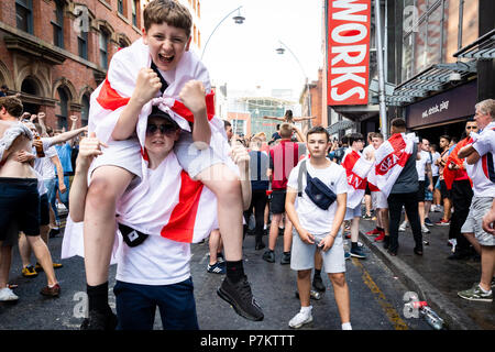 Manchester, UK. 7th July 2018. Fans celebrate England win over Sweden in World Cup. Credit: Andy Barton/Alamy Live News Stock Photo