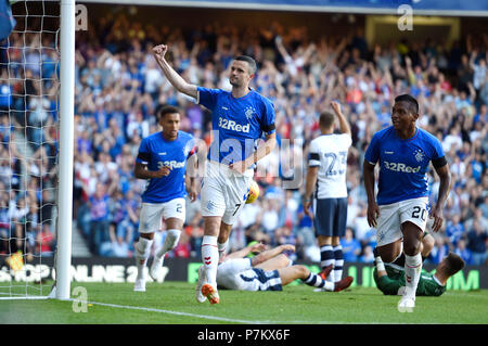 Rangers Jamie Murphy (left) celebrates scoring his side's first goal of the game during a pre-season friendly match at Ibrox Stadium, Glasgow. Stock Photo
