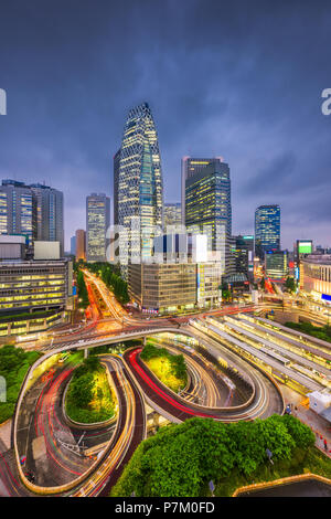 Tokyo, Japan cityscape over traffic loops in the Shinjuku financial district at night. Stock Photo