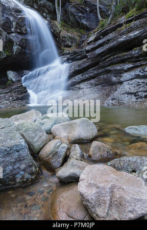 Bridal Veil Falls on Coppermine Brook in Franconia, New Hampshire during the spring months. This waterfall looks great during the spring snowmelt and  Stock Photo