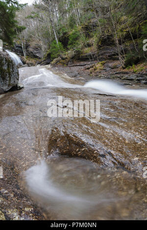 Bridal Veil Falls On Coppermine Brook In Franconia New Hampshire During The Spring Months This Waterfall Looks Great During The Spring Snowmelt And Stock Photo Alamy