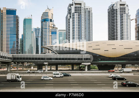 Futuristic building of Dubai metro station and highway in Dubai, United Arab Emirates