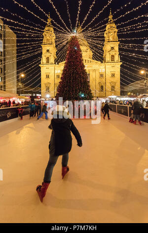 Ice skating on Christmas time, St. Stephen's Basilica, Budapest, Hungary Stock Photo
