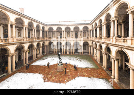 Courtyard of honor of the Palace of Brera during snowfall, Milan, Lombardy, Northern Italy, Italy, Stock Photo