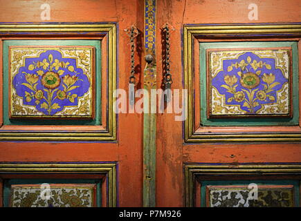 Beautiful silk road wooden door - close up on decorations at the archaeological museum of Qazvin, Iran Stock Photo