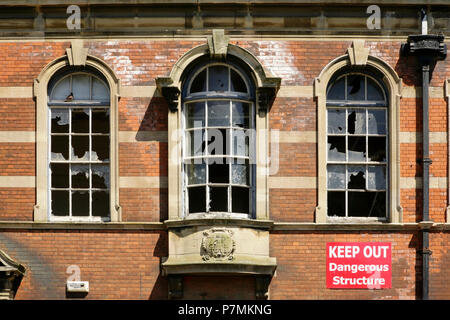 Windows in the abandoned and now Grade II listed Victorian School Board Offices (1901), Eleanor Street, Grimsby, UK. Stock Photo