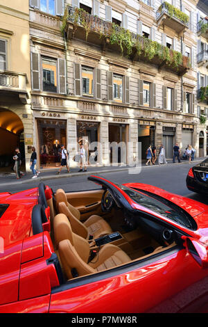 Italy, Lombardy, Milan, Fashion Quadrilateral, a Ferrari in Via Monte Napoleone Stock Photo