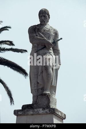 MONUMENTO CONMEMORATIVO A GUZMAN EL BUENO SITUADO EN EL PASEO DE LA ALAMEDA INAUGURADO EN 1960. Author: REINE JIMENEZ MANUEL 1933-. Location: EXTERIOR, TARIFA, CADIZ, SPAIN. Stock Photo