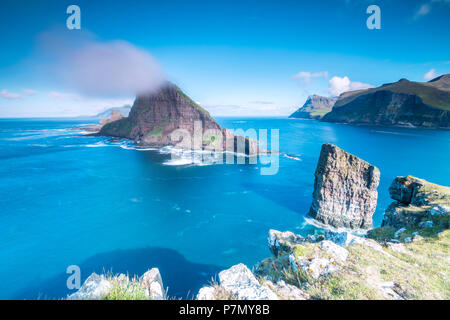 The sea stacks of Drangarnir and Tindholmur islet, Vagar Island, Faroe Islands Stock Photo
