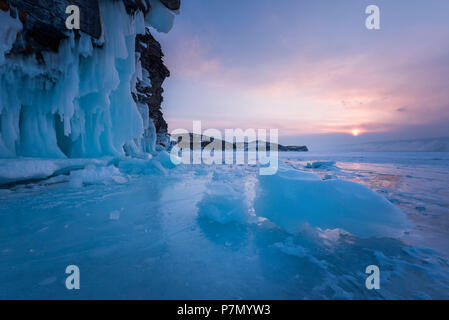 Pieces of ice at sunset at lake Baikal, Irkutsk region, Siberia, Russia Stock Photo