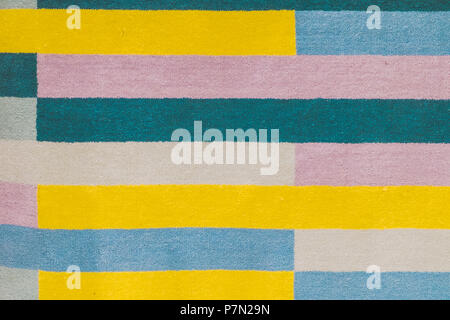 Colorful carpet with hand made graphic pattern. Stock Photo