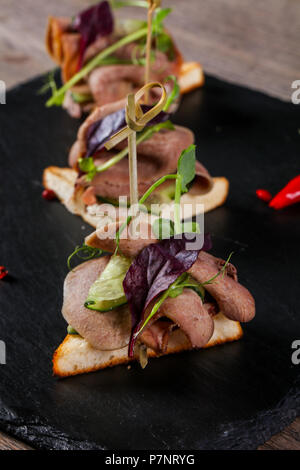 Beef canape served green onion Stock Photo