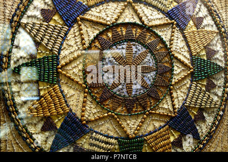 English: Artwork created by John Hampson from thousands of insects (butterfly wings, beetles, etc.). Exhibited in the Fairbanks Museum and Planetarium, St. Johnsbury, Vermont, USA. This artwork is in the  because the artist died more than 70 years ago. Photography was permitted in the museum without restriction. 18 August 2013, 13:04:52 63 Centennial Wheel by John Hampson, completed in 1892 - Fairbanks Museum and Planetarium - DSC04264 Stock Photo