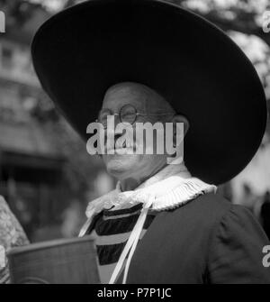 Old man with very large hat, carnival, around 1950, Freiburg, Germany Stock Photo