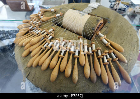 English: Exhibit in the Bennington Museum - Bennington, Vermont, USA. This work is in the  because the artist died more than 70 years ago. Photography was permitted in the museum without restriction. 28 February 2015, 13:03:52 48 Bobbin lace - Bennington Museum - Bennington, VT - DSC08608 Stock Photo