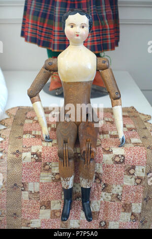 English: Exhibit in the Bennington Museum - Bennington, Vermont, USA. This work is in the  because the artist died more than 70 years ago. Photography was permitted in the museum without restriction. 28 February 2015, 13:17:21 135 Doll, unidentified - Bennington Museum - Bennington, VT - DSC08683 Stock Photo