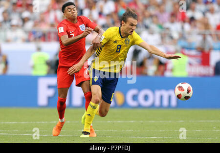 England's Jesse Lingard (left) and Sweden's Albin Ekdal battle for the ball during the FIFA World Cup, Quarter Final match at the Samara Stadium. Stock Photo