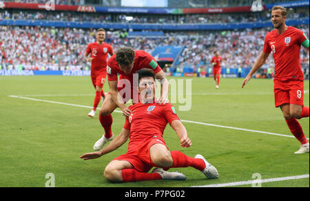 England's Harry Maguire celebrates scoring his side's first goal of the game with John Stones (top) during the FIFA World Cup, Quarter Final match at the Samara Stadium. Stock Photo