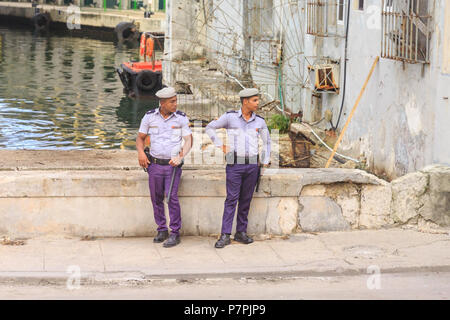 Two Cuban policemen, polizia especialisada, male police officers on patrol in Habana Vieja, Havana, Cuba Stock Photo