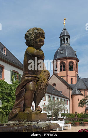 Putto in the monastery garden of St. Marcellinus and Peter in Seligenstadt, Germany Stock Photo