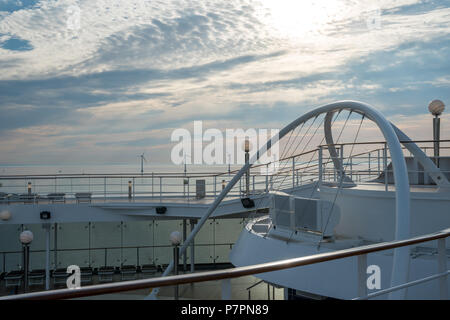 offshore windmill park alternative energy. windmills in the sea behind the cruise ship denmark Stock Photo