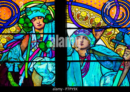Detail of art nouveau stained glass window by Alfons Mucha, St. Vitus Cathedral, Prague castle, Czech Republic - women who symbolize Czech and Slovaki Stock Photo