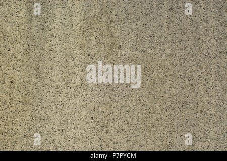 Smooth even stone surface. Grey with granules of a darker colour Stock Photo