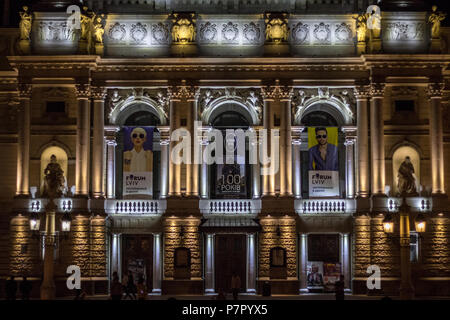 LVIV, UKRAINE - AUGUST 19, 2015: People standing in front the facade of Lviv Opera at sunset. The opera is one of the main monuments and landmarks of  Stock Photo