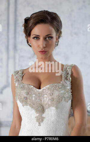 Wedding dress in Paris. Bride in a luxury apartment in a wedding dress. Stock Photo