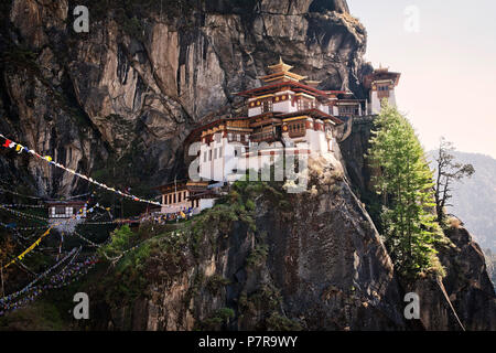 The Taktsang Palphug Monastery or the Tigers Nest near Paro Bhutan was originally constructued in 1692. Stock Photo