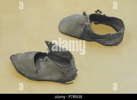 Scandinavian. Medieval Shoes for children. Cowhide. 13th century. Historical Museum. Oslo. Norway. Stock Photo