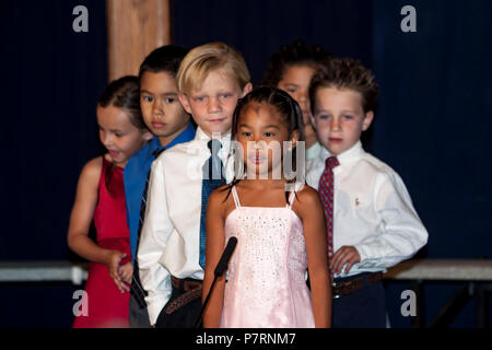 Kindergarten age kids line up to take a part in reciting on stage.  © Myrleen Pearson.   ....Ferguson Cate Stock Photo