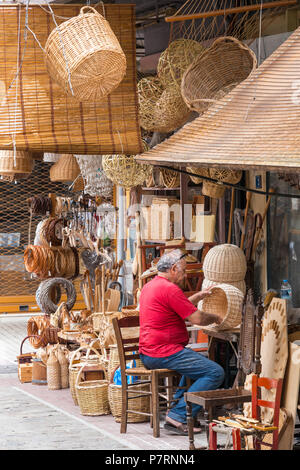 Makeing cane baskets in the Modiano Market, Thessaloniki Macedonia, Northern Greece Stock Photo