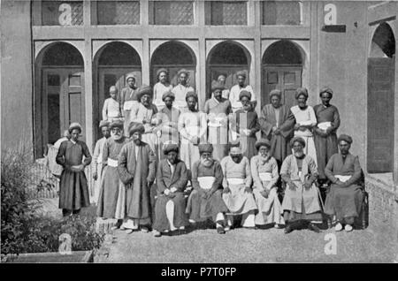 English: Ardeshir Meheban Irani and the Leading Members of the Anguman-i-Nasseri (Parsee National Assembly), Yezd. Photographed by Arnold Henry Savage Landor, late 1901 or early 1902. From page 394 of ACROSS COVETED LANDS. 1901 or 1902 (photographed); 1902 (published) 25 Ardeshir Meheban Irani and the Leading Members of the Anguman-i-Nasseri - ill1-49 Stock Photo
