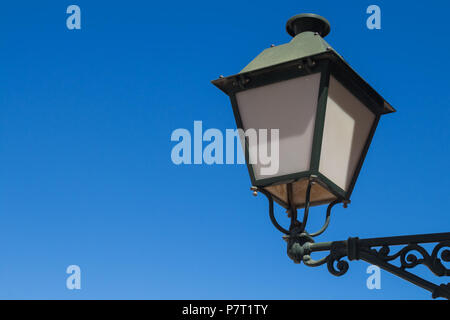 Lantern in a traditional style during the day. Bright clear blue sky. Estoi, Algarve, Portugal. Stock Photo