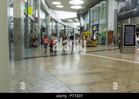 Silverburn, Scotland, UK - July 06, 2018: People taking advantage of the air conditioned shopping mall at Silverburn during a unusually hot spell in S Stock Photo