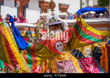 Leh, India - July 4, 2017: Unidentified monks in mask performing a religious masked and costumed mystery dance of Tibetan Buddhism during the Buddhist Stock Photo