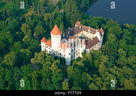 AERIAL VIEW. Medieval castle in a wooded area. Konopiště Castle, Benešov, Central Bohemian Region, Czech Republic. Stock Photo