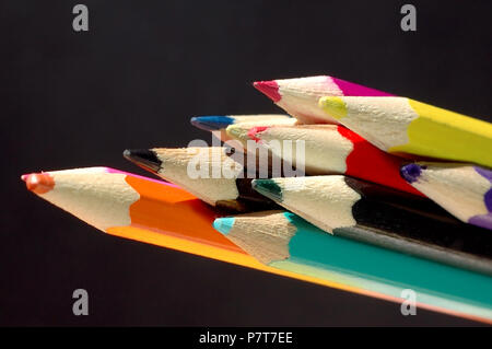 Set of colored pencils on black background Stock Photo