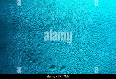 Water droplets on turquoise background. Stock Photo