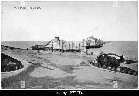 Postcard dated 1910-1928 showing the third Herne Bay Pier which was built 1899. The Grand Pier Pavilion was built 1910, and the theatre and shops at the pier entrance burned down 1928. between 1910 and 1928 10 3rd Herne Bay Pier 1910-28 031 Stock Photo