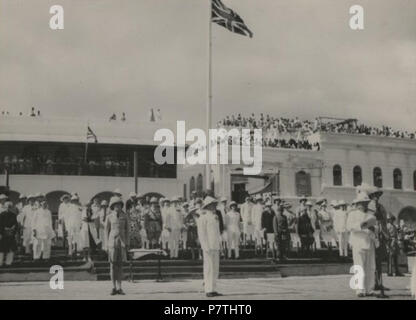 English: Photograph taken in Aden in January 1939 during ceremonies held in celebration of the centennial of British rule in Aden. On the right, the governor, Sir Bernard Reilly, is reading a proclamation. 22 May 2014, 14:35:45 13 Aden Centennial 1939 Stock Photo