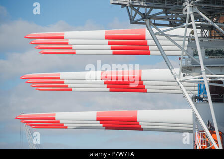 Sassnitz, Germany. 02nd July, 2018. The wind turbine installation vessel SEA CHALLENGER heads out from Mukran Port laden with parts for the Arkona offshore wind farm. Credit: Stefan Sauer/dpa-Zentralbild/dpa/Alamy Live News Stock Photo