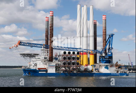 Sassnitz, Germany. 02nd July, 2018. The wind turbine installation vessel SEA CHALLENGER heads out from Mukran Port laden with parts for the Arkona offshore wind farm. Credit: Stefan Sauer/dpa-Zentralbild/dpa/Alamy Live News Stock Photo