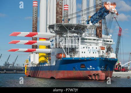 Sassnitz, Germany. 02nd July, 2018. The wind turbine installation vessel SEA CHALLENGER heads out from Mukran Port laden with parts for the Arkona offshore wind farm. Credit: Stefan Sauer/dpa-Zentralbild/dpa/Alamy Live News Stock Photo