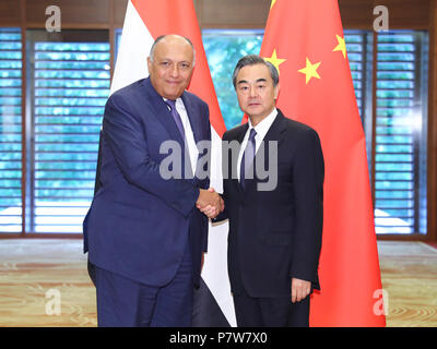 Beijing, China. 8th July, 2018. Chinese State Councilor and Foreign Minister Wang Yi (R) and Egyptian Foreign Minister Sameh Shoukry hold the strategic dialogue between China and Egypt's foreign ministries in Beijing, capital of China, July 8, 2018. Credit: Xie Huanchi/Xinhua/Alamy Live News Stock Photo